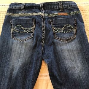 Cowgirl Tuff distressed embroidered boot cut jeans